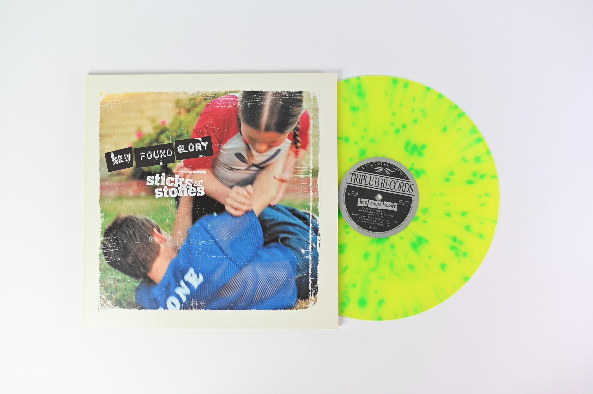 New Found Glory Sticks And Stones on Triple B Ltd Yellow Green Splatter Reissue