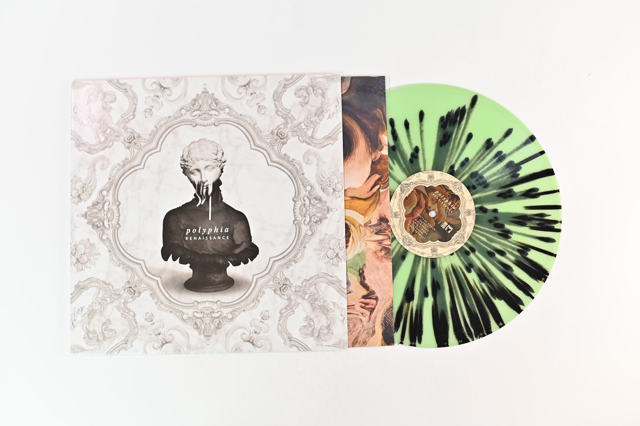 Polyphia - Renaissance on Equal Vision Ltd Coke Bottle Clear w/Black Splatter Reissue