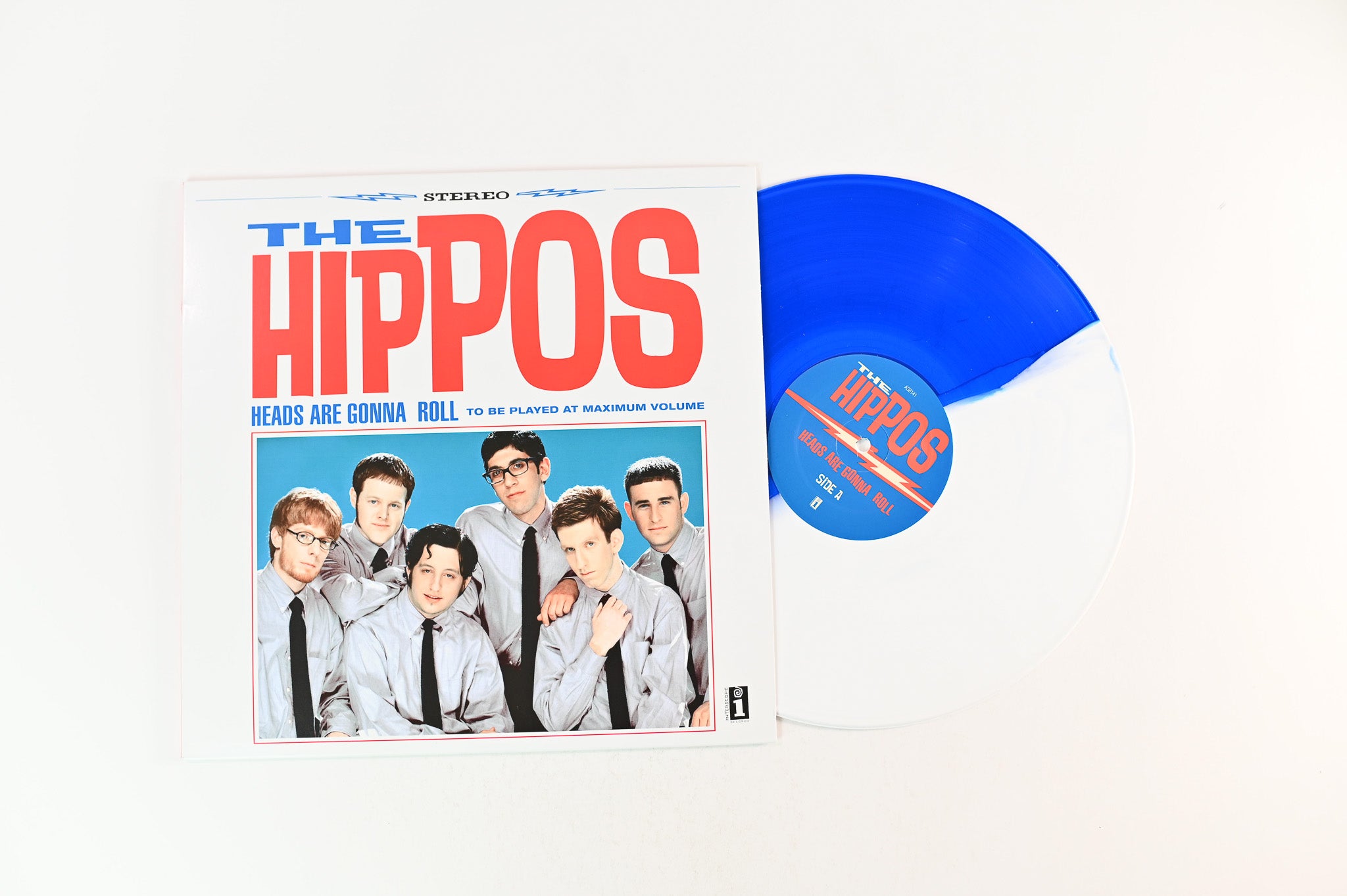 The Hippos - Heads Are Gonna Roll on Asbestos Blue / White Split Vinyl