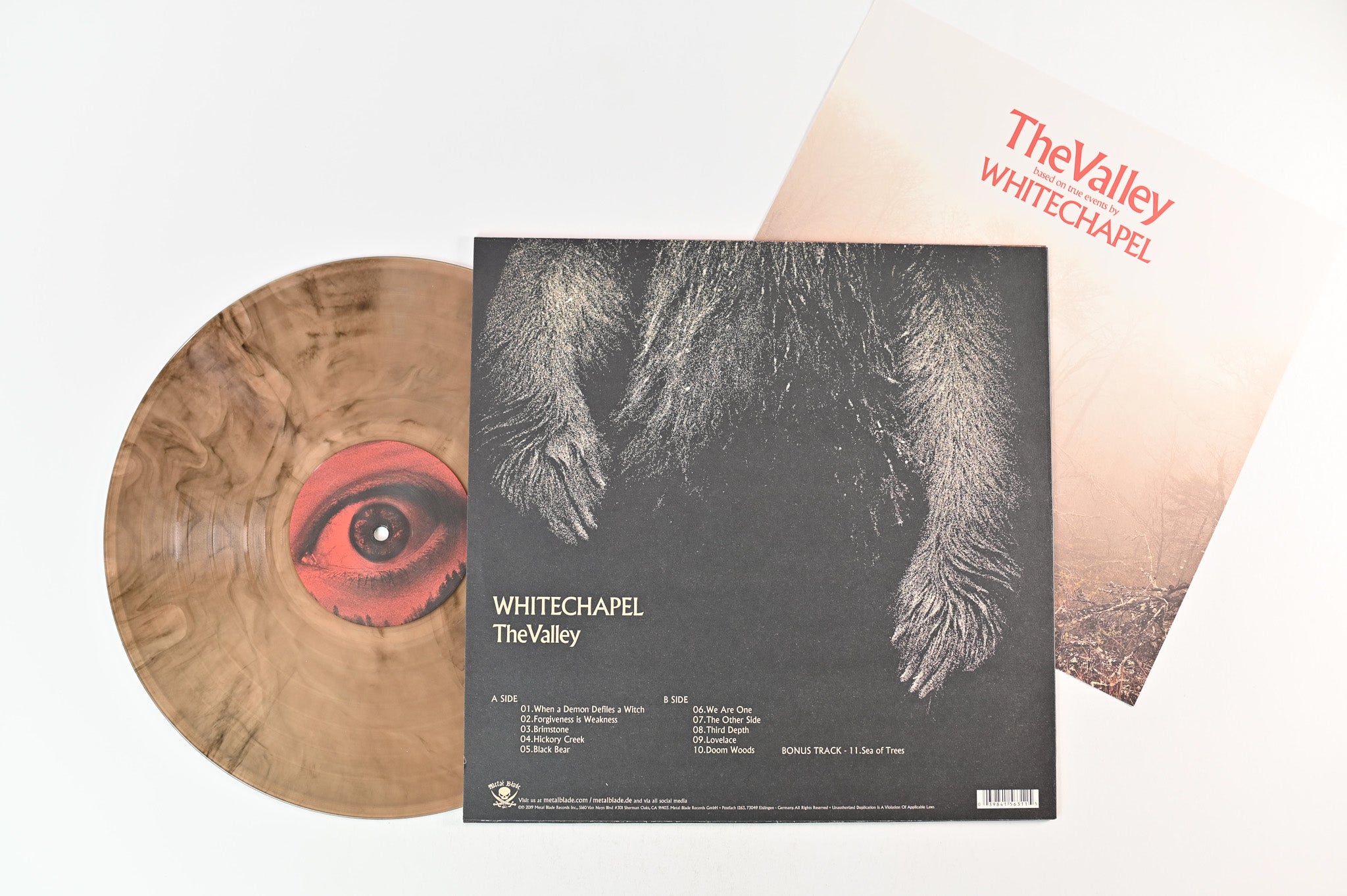 Whitechapel - The Valley on Metal Blade Ltd Wood Brown Marbled Reissue