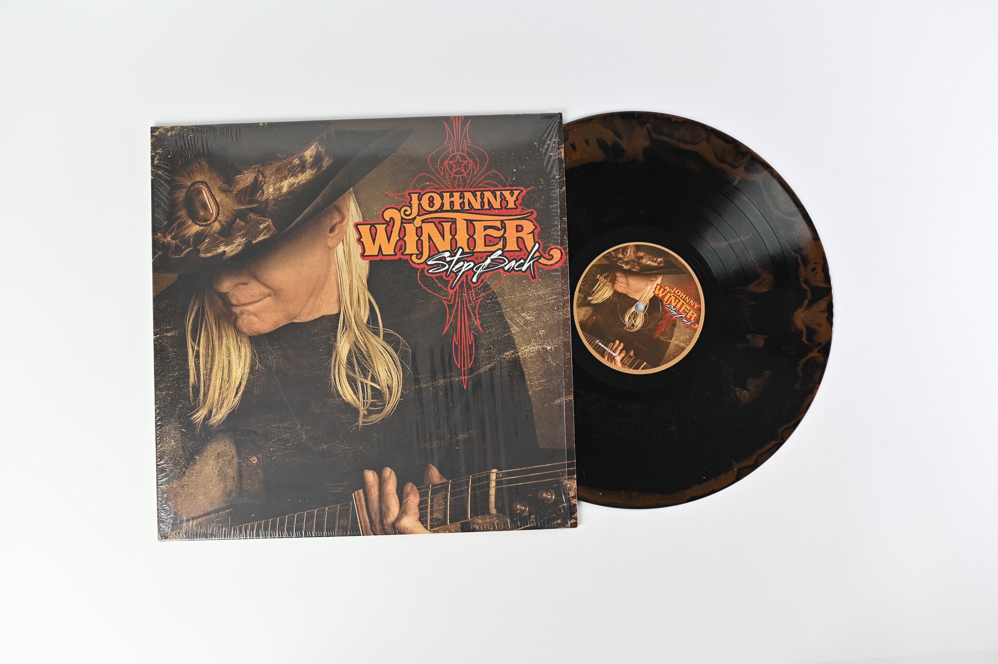 Johnny Winter - Step Back on Megaforce Records - Brown Swirl Vinyl