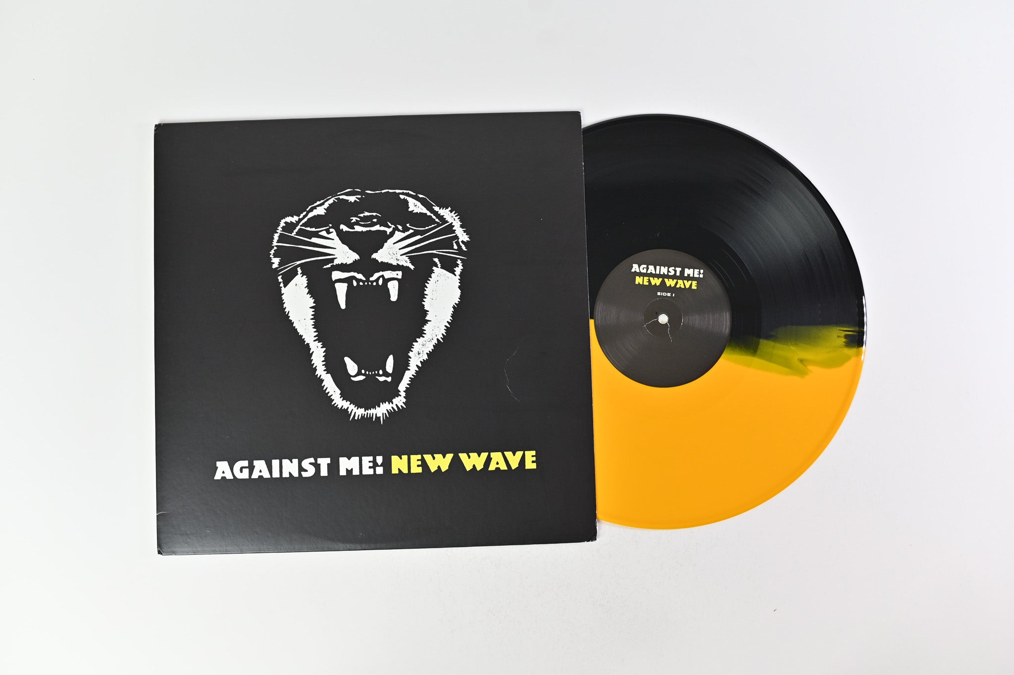 Against Me! - New Wave on Asbestos Records - Yellow/Black Split Colored Vinyl