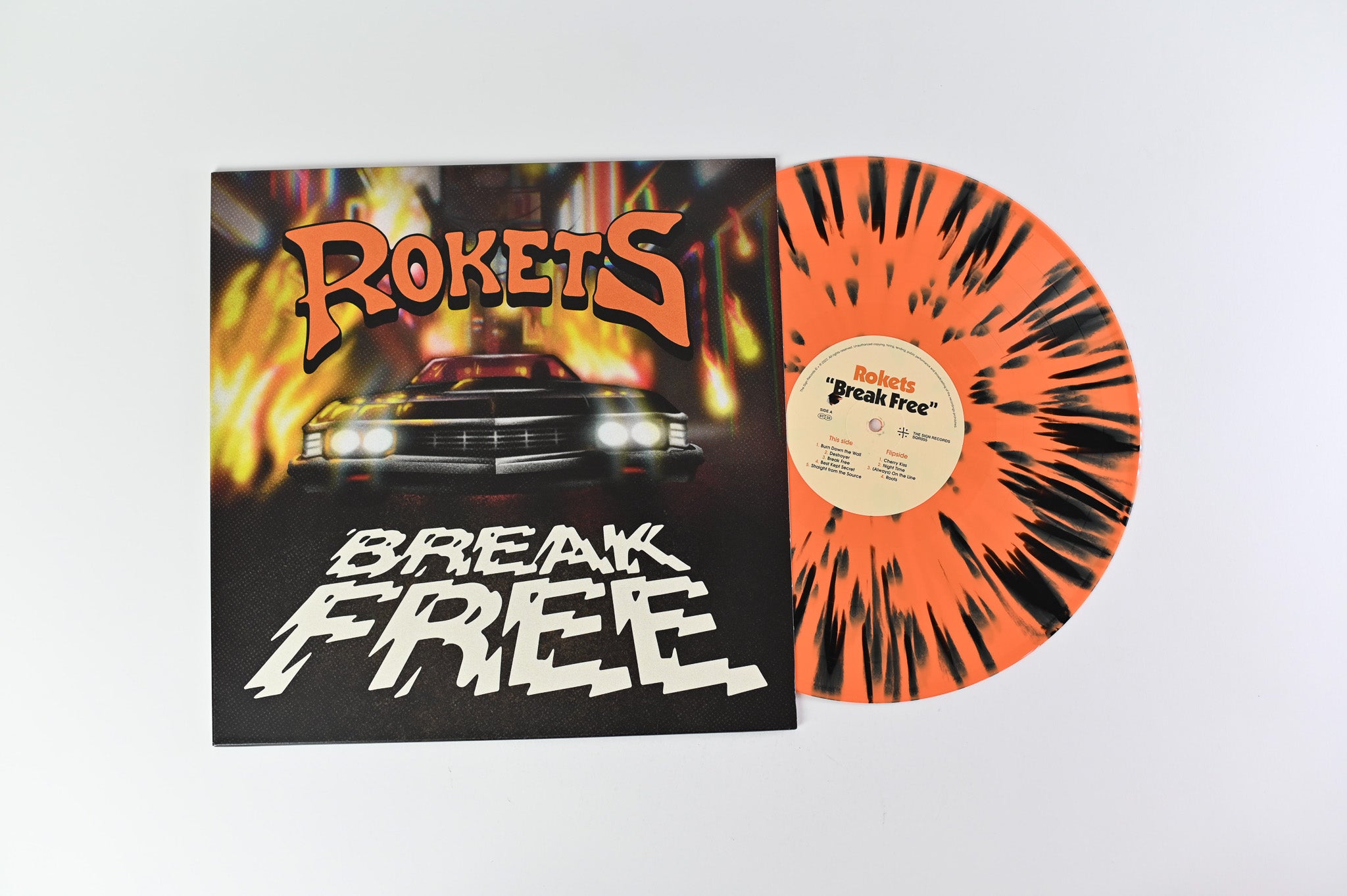 Rokets - Break Free on The Sign Records Orange/Black Splatter Vinyl