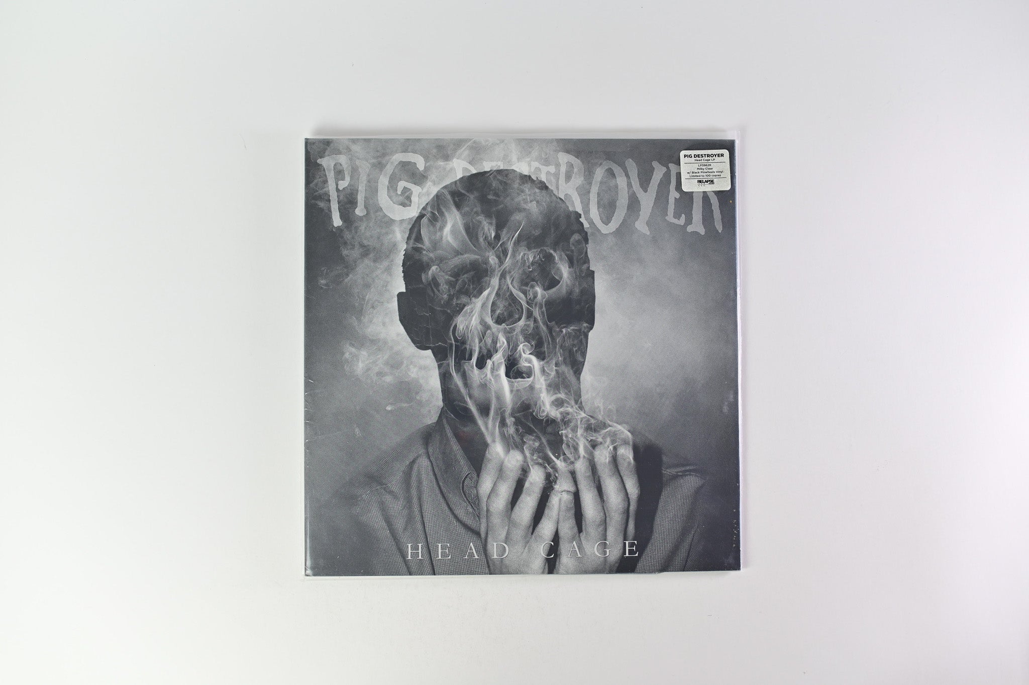 Pig Destroyer - Head Cage on Relapse Ltd Milky Clear with Black Pinwheels