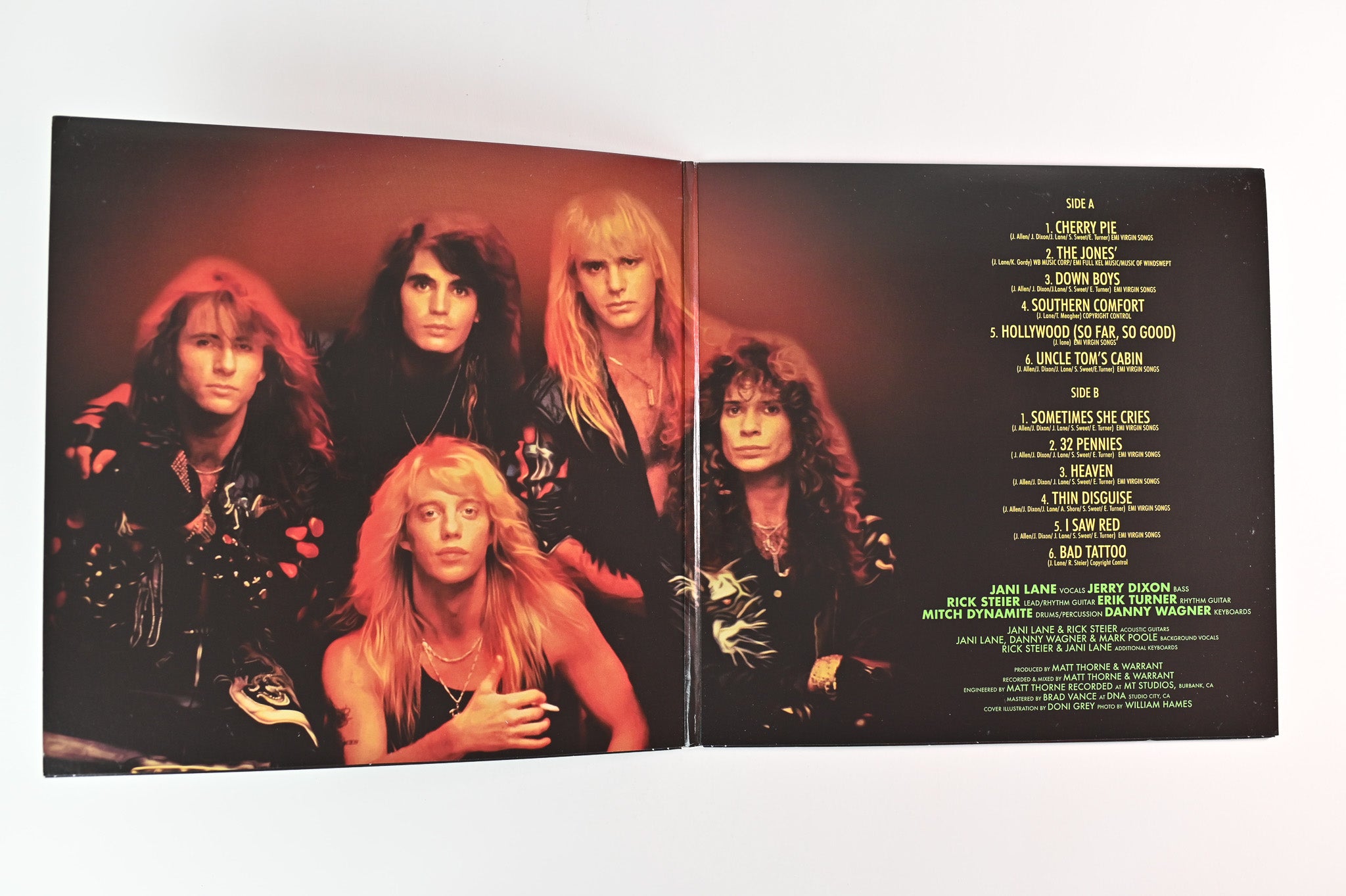 Warrant - Greatest & Latest on Deadline Music - Red & Black Splatter Vinyl