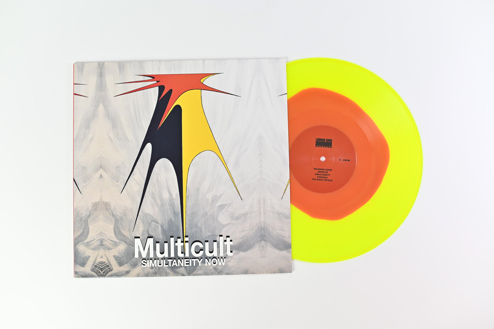 Multicult - Simultaneity Now on Learning Curve Ltd Red in Yellow