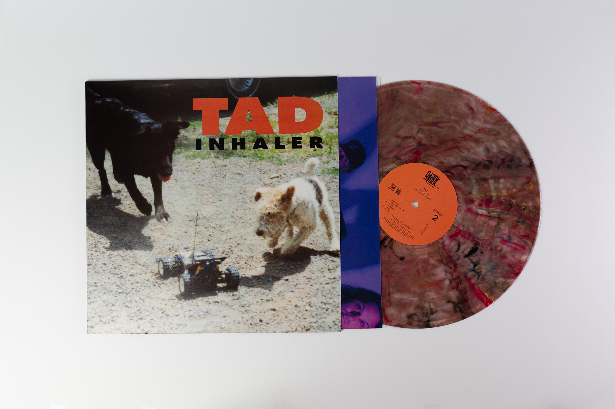 Tad - Inhaler on Real Gone RSD 2021 Tan Black & Red Swirl Reissue