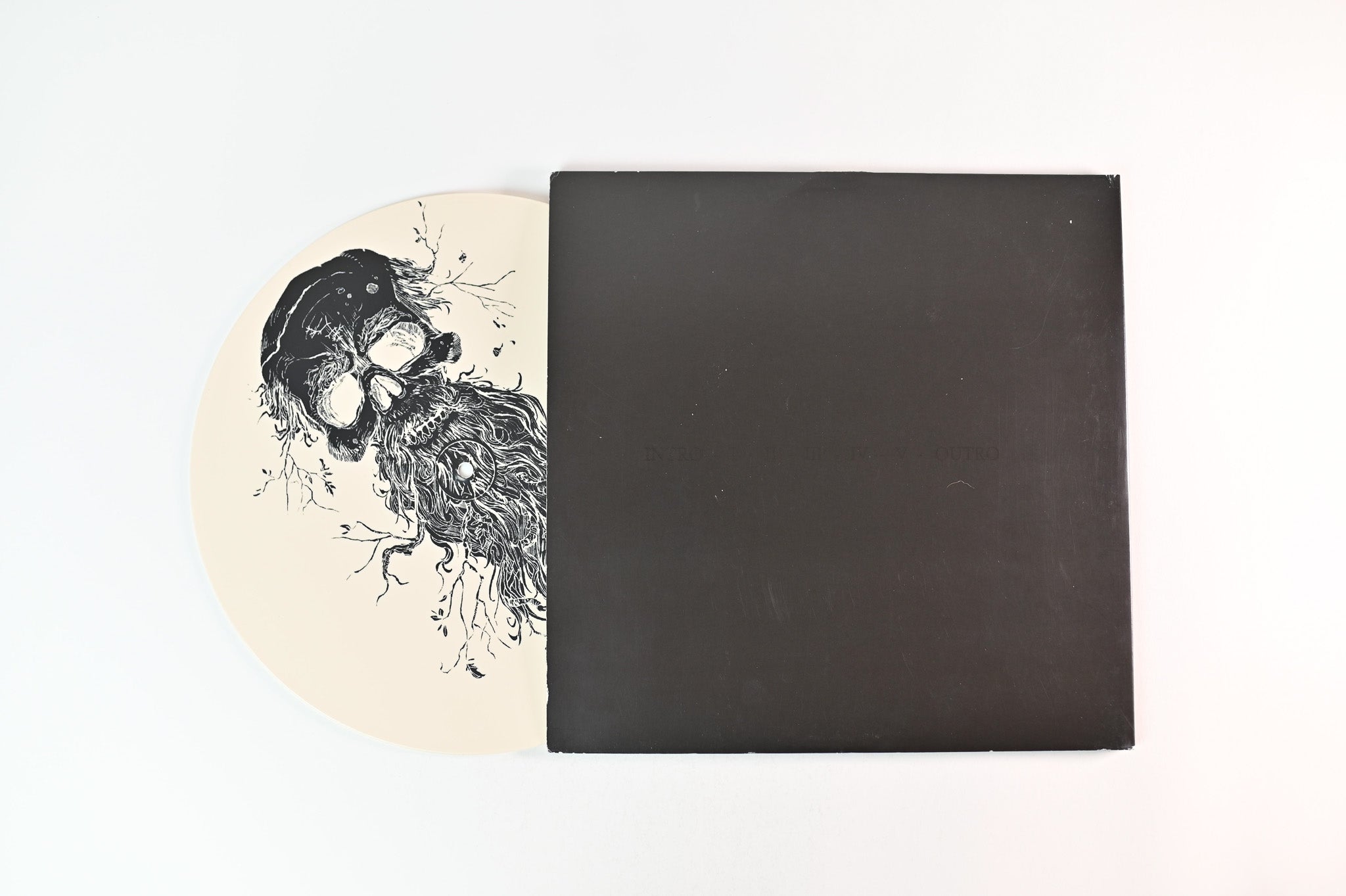 Vestiges - The Descent Of Man on Replenish Ltd Bone Vinyl With Screenprinted D-Side Reissue