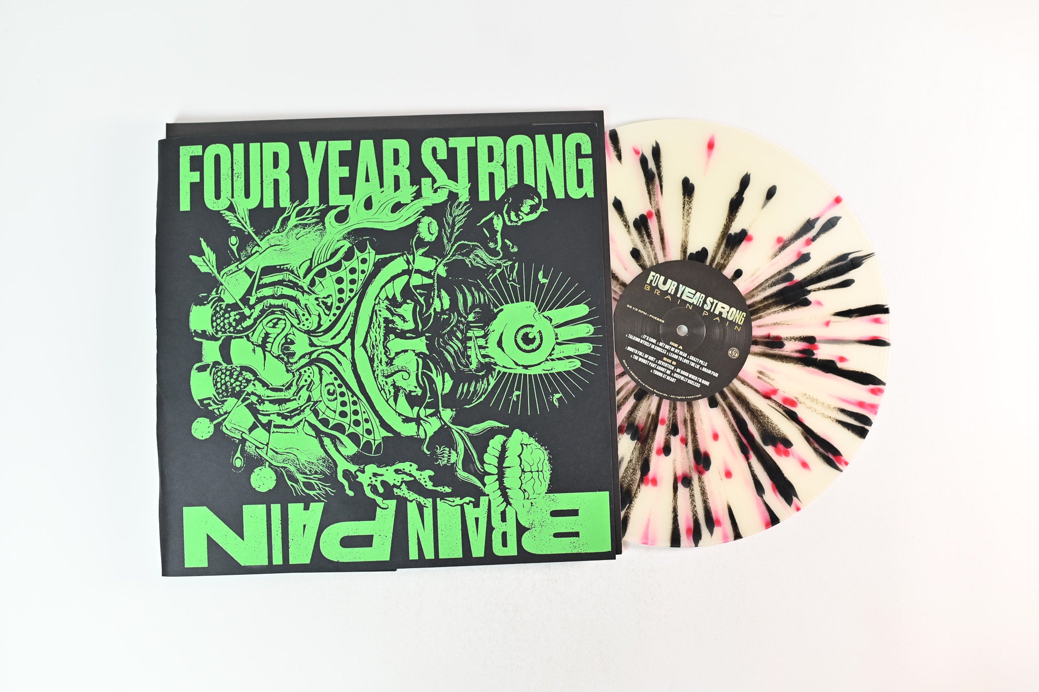 Four Year Strong - Brain Pain on Pure Noise Ltd Numbered Glow in the Dark Splatter Vinyl